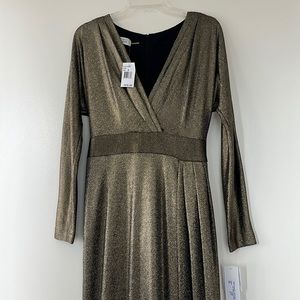 Worn once elegant dress with a slit!